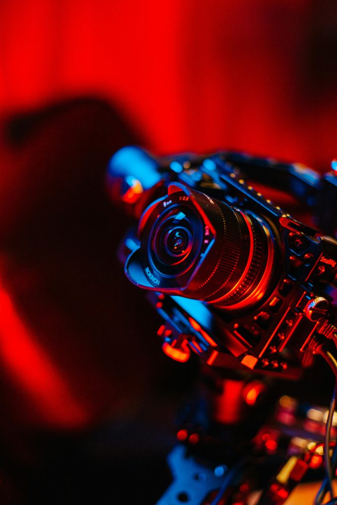 pexels photo 2823919 2823919 A DSLR camera with vibrant lighting on a photography set.